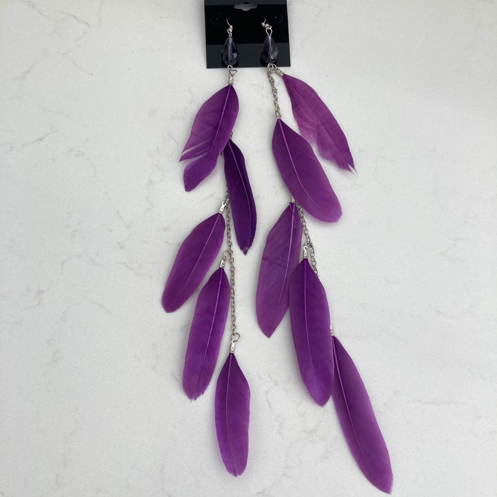 Long flirty purple feathers dangly earrings